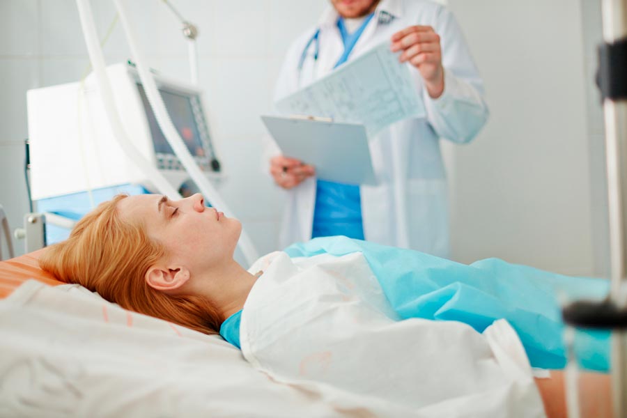 Woman bed in hospital